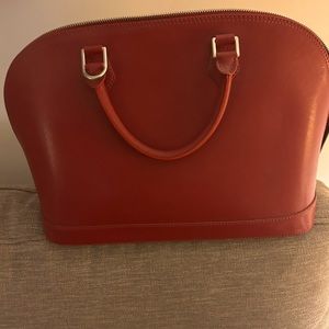 Pulicati leather hand bag